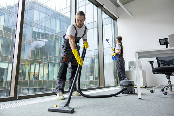 Cherish cleaning technicians servicing a modern office